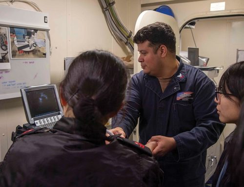 Phoenix native demonstrates medical equipment to Japanese Sailors aboard USS America